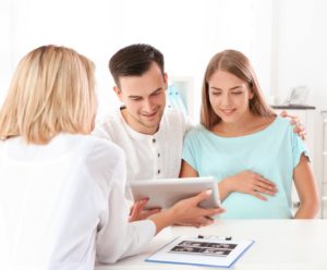 Physician advising couple